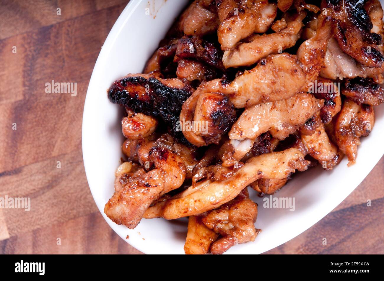 chicken thighs for stir fry Stock Photo Alamy