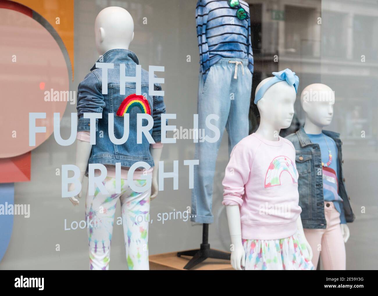 J Crew clothing store window which has 