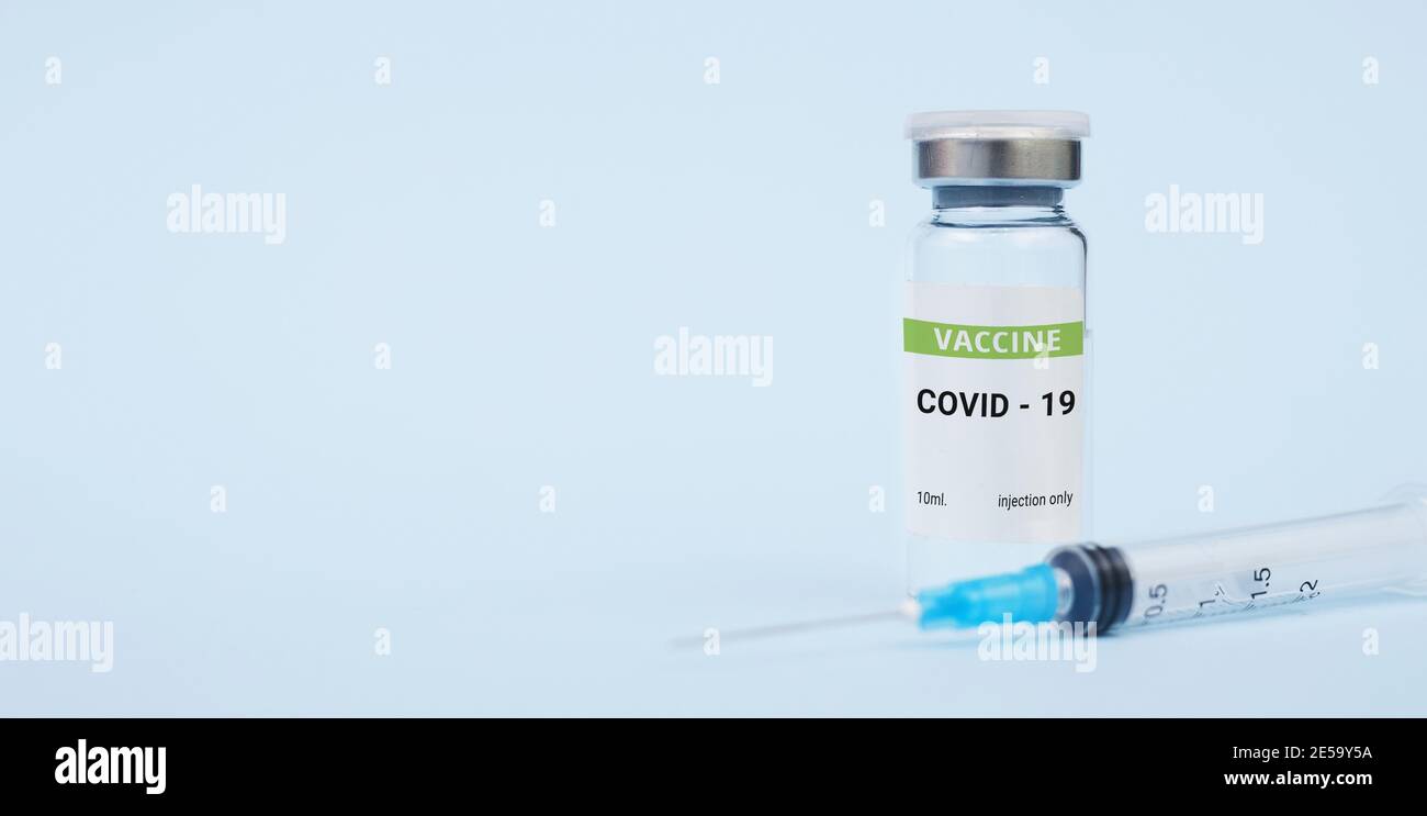 Vaccine against coronavirus, covid-19 concept. on a blue background. copy space, banner Stock Photo