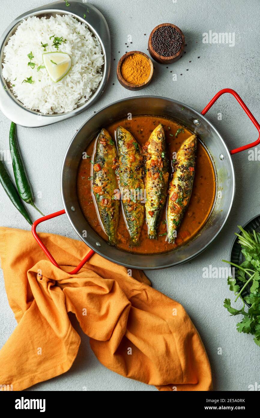 indian style fish curry, sardine with black mustard sauсe Stock Photo Alamy
