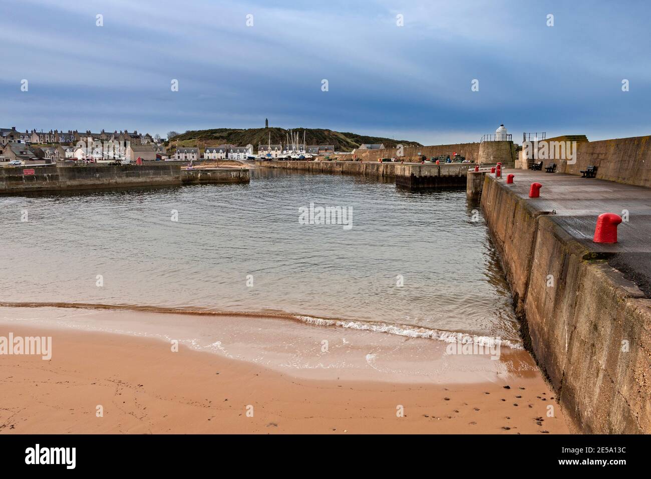 FINDOCHTY MORAY COAST SCOTLAND THE VILLAGE HOUSES THE HARBOUR WALL AND