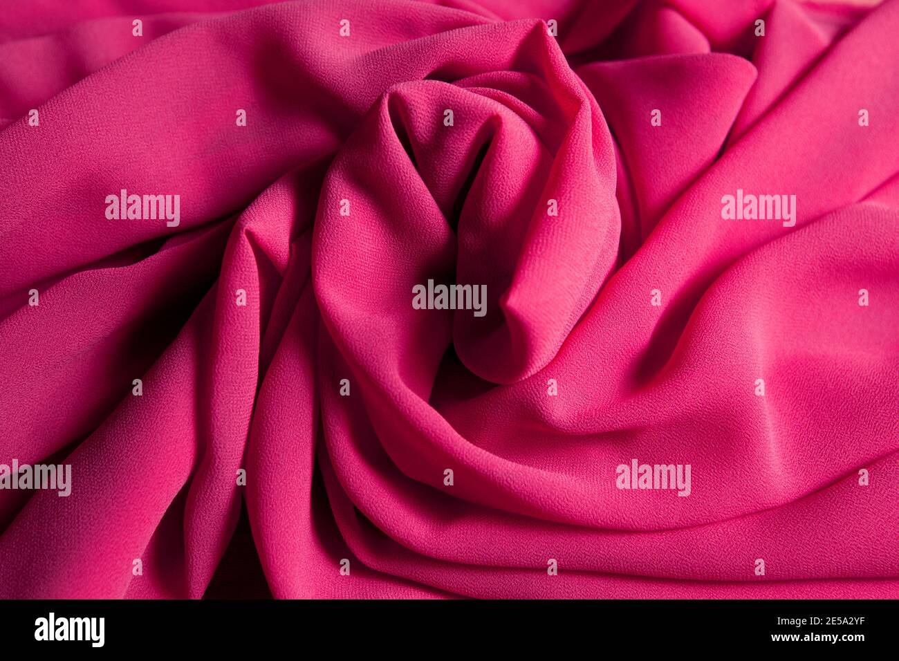 pink crumpled tulle fabric. fabric background Stock Photo