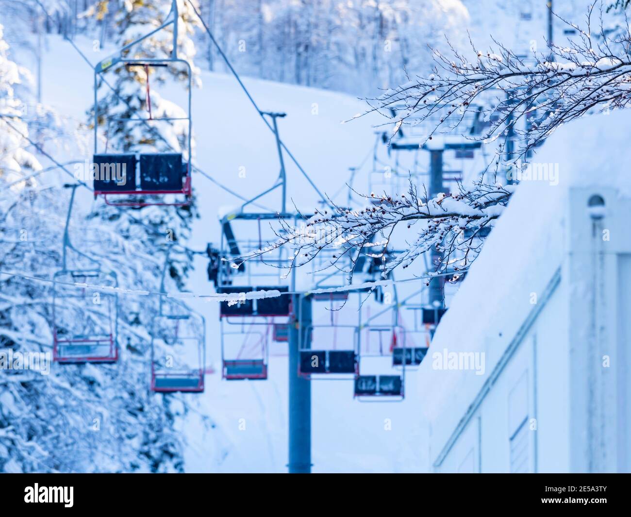 Empty early morning scenery in Platak Radesevo ski resort in Croatia Europe empty vacant seats ski carriage carriages Stock Photo