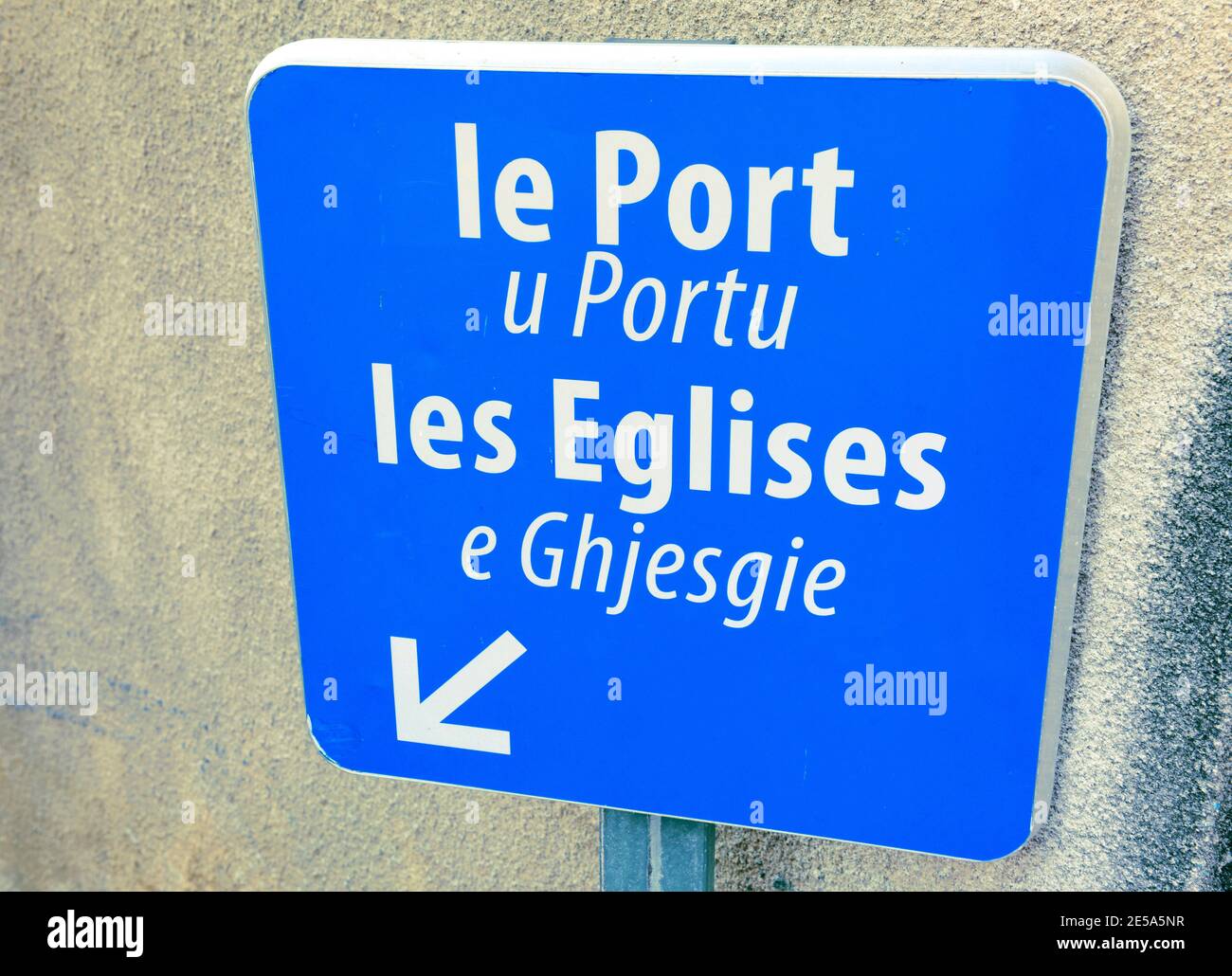 direction sign to the port and the churches, France, Corsica, Cargese Stock Photo