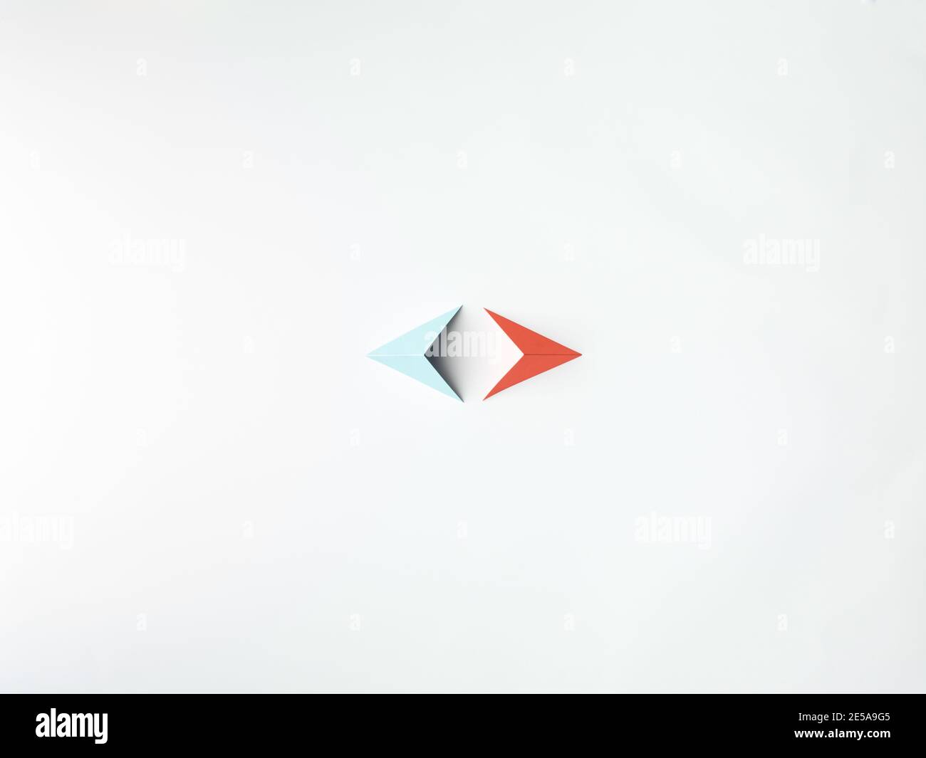 blue and red paper pyramid , on white background copy space available ...