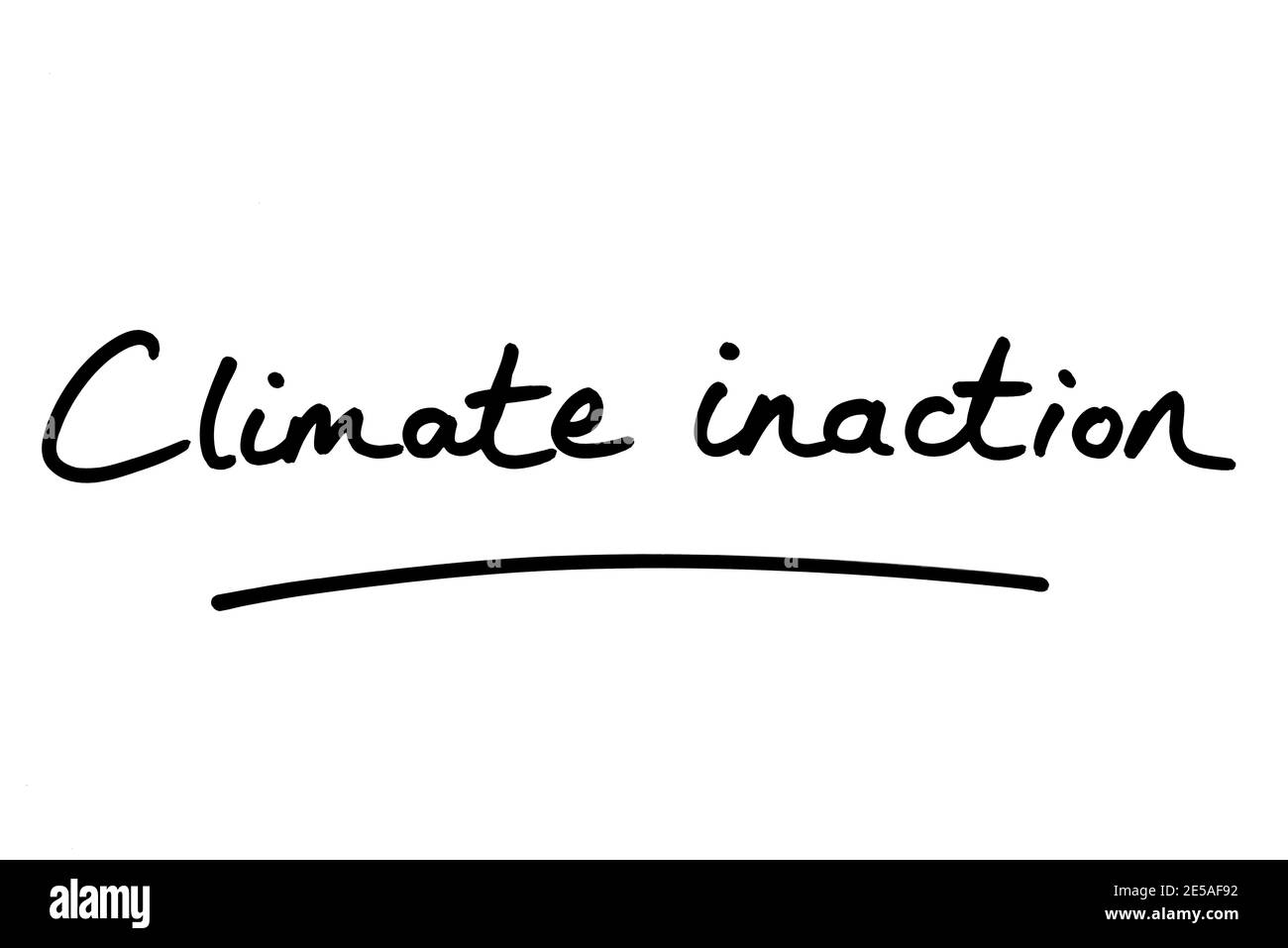 Climate inaction, handwritten on a white background. Stock Photo