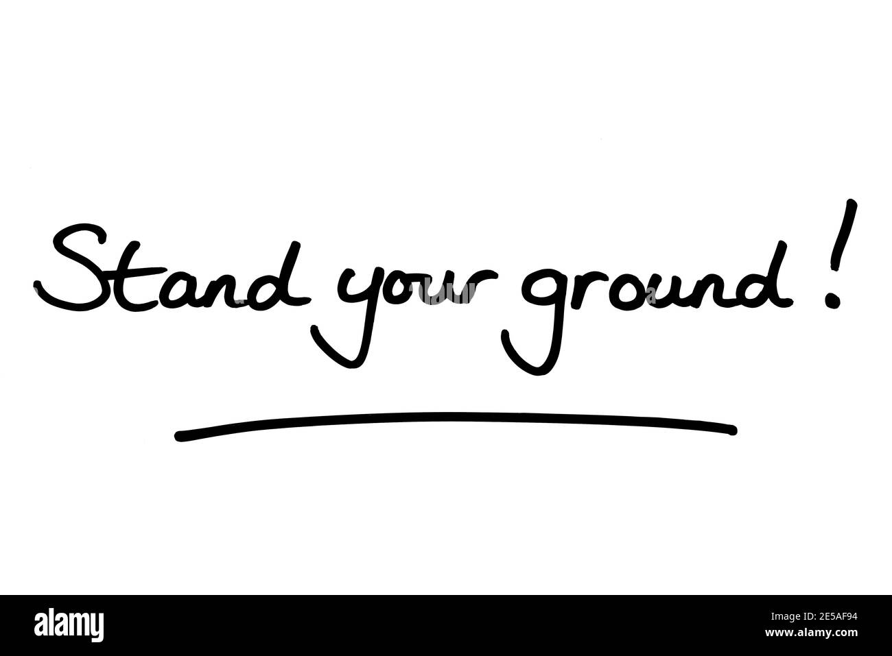 Stand your ground! handwritten on a white background Stock Photo Alamy