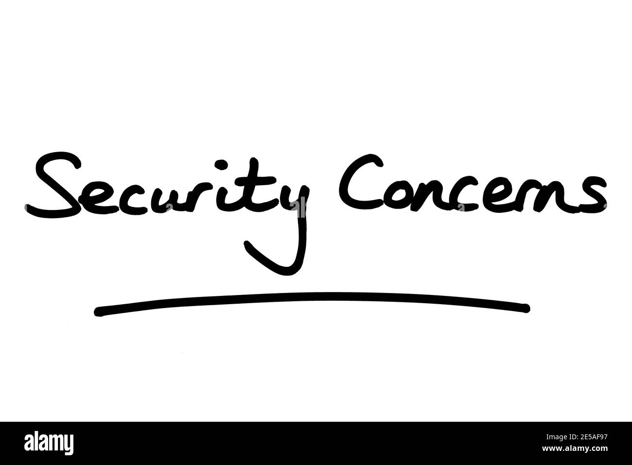 Security Concerns, handwritten on a white background. Stock Photo
