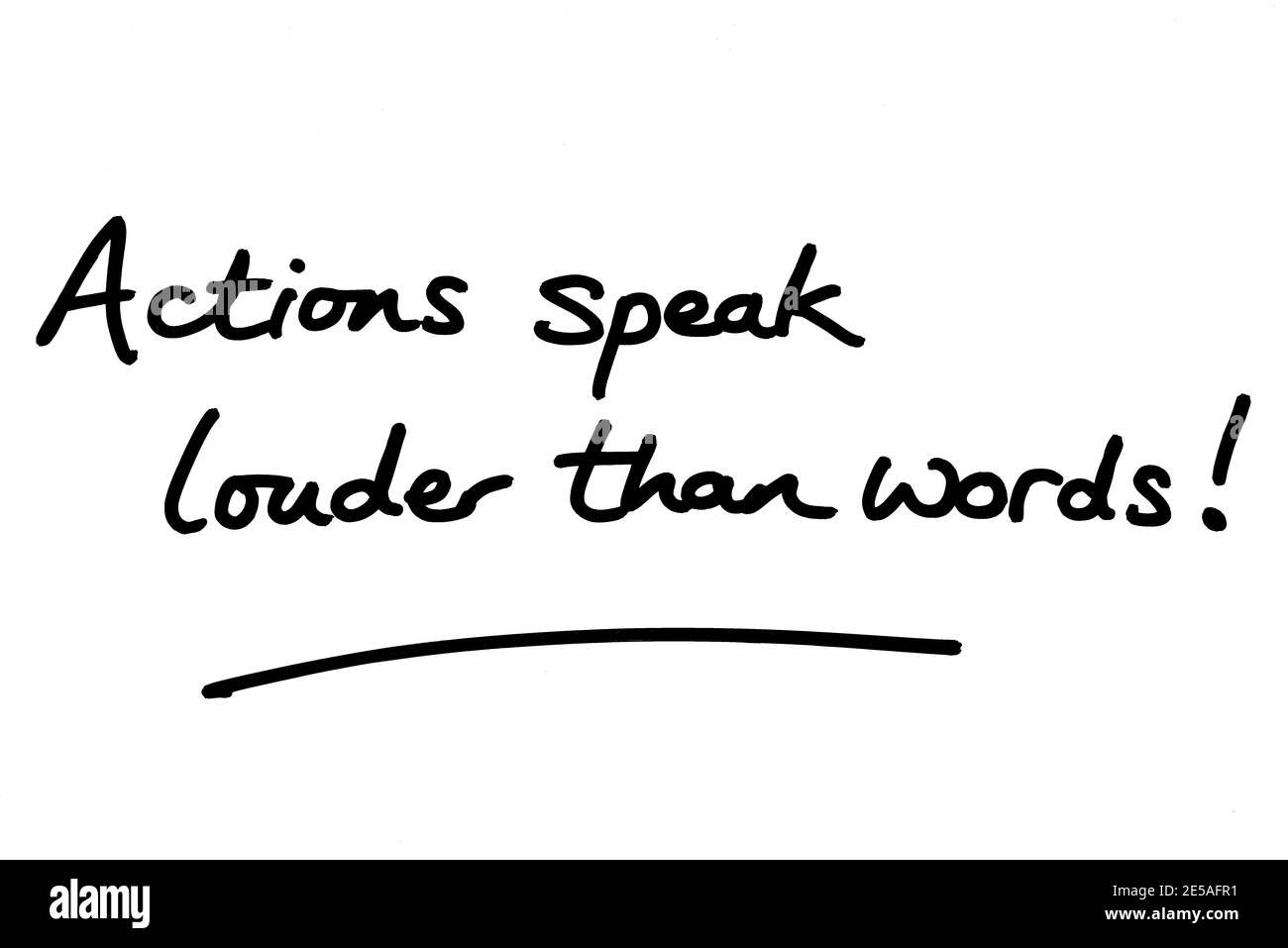 Actions speak louder than words! handwritten on a white background. Stock Photo