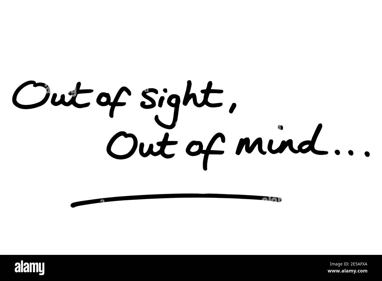 Out of sight, Out of mind… handwritten on a white background. Stock Photo