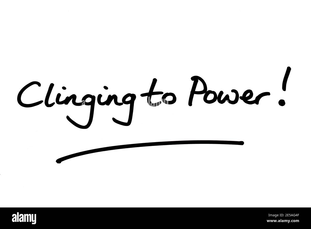 Clinging to Power! handwritten on a white background. Stock Photo