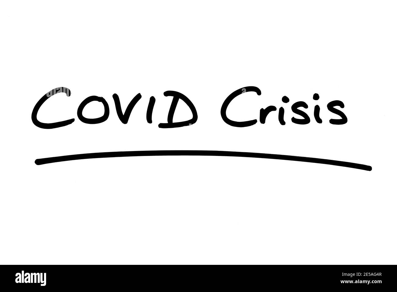 COVID Crisis, handwritten on a white background. Stock Photo