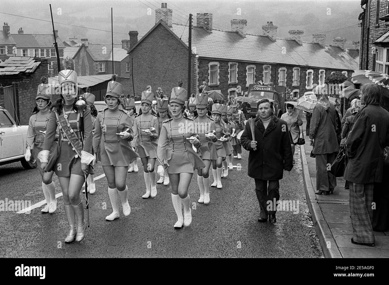 A jazz band marching through the streets of Cwmfelinfach on a wet