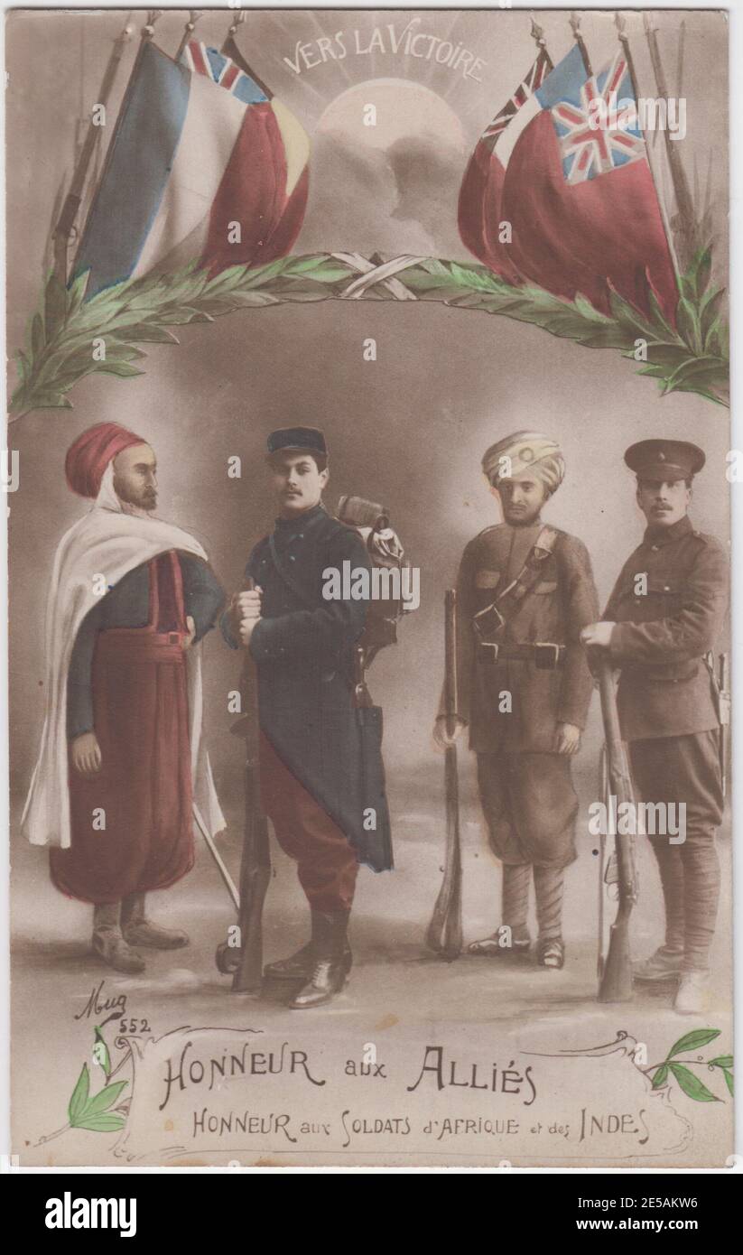 French First World War postcard showing allies from three continents - soldiers from France, Britain, India and North Africa. Allied flags and a rising sun are at the top of the image. The card was posted to Britain in 1915 from the Western Front. Stock Photo