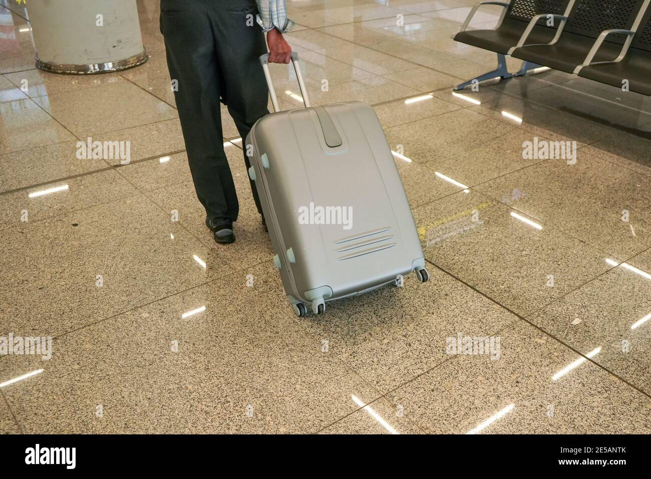 Man dragging bag hi-res stock photography and images - Alamy