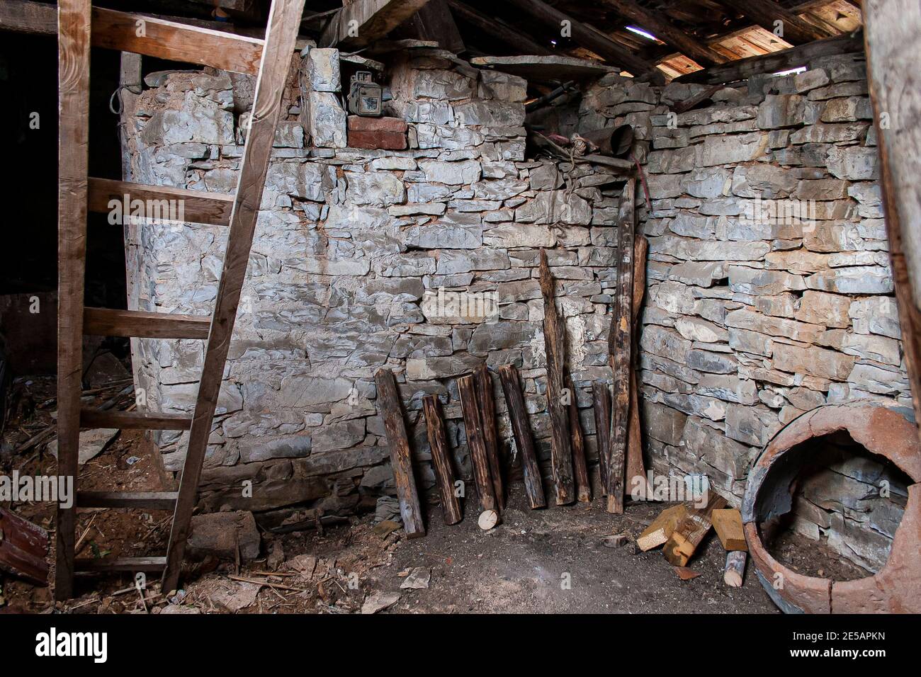 Traditional old stone barn in a village in Bulgaria Stock Photo