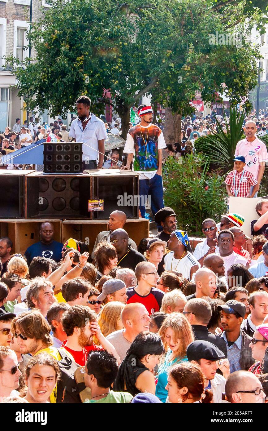 Crowds dancing at a sound system at Notting Hill Carnival, London Stock Photo