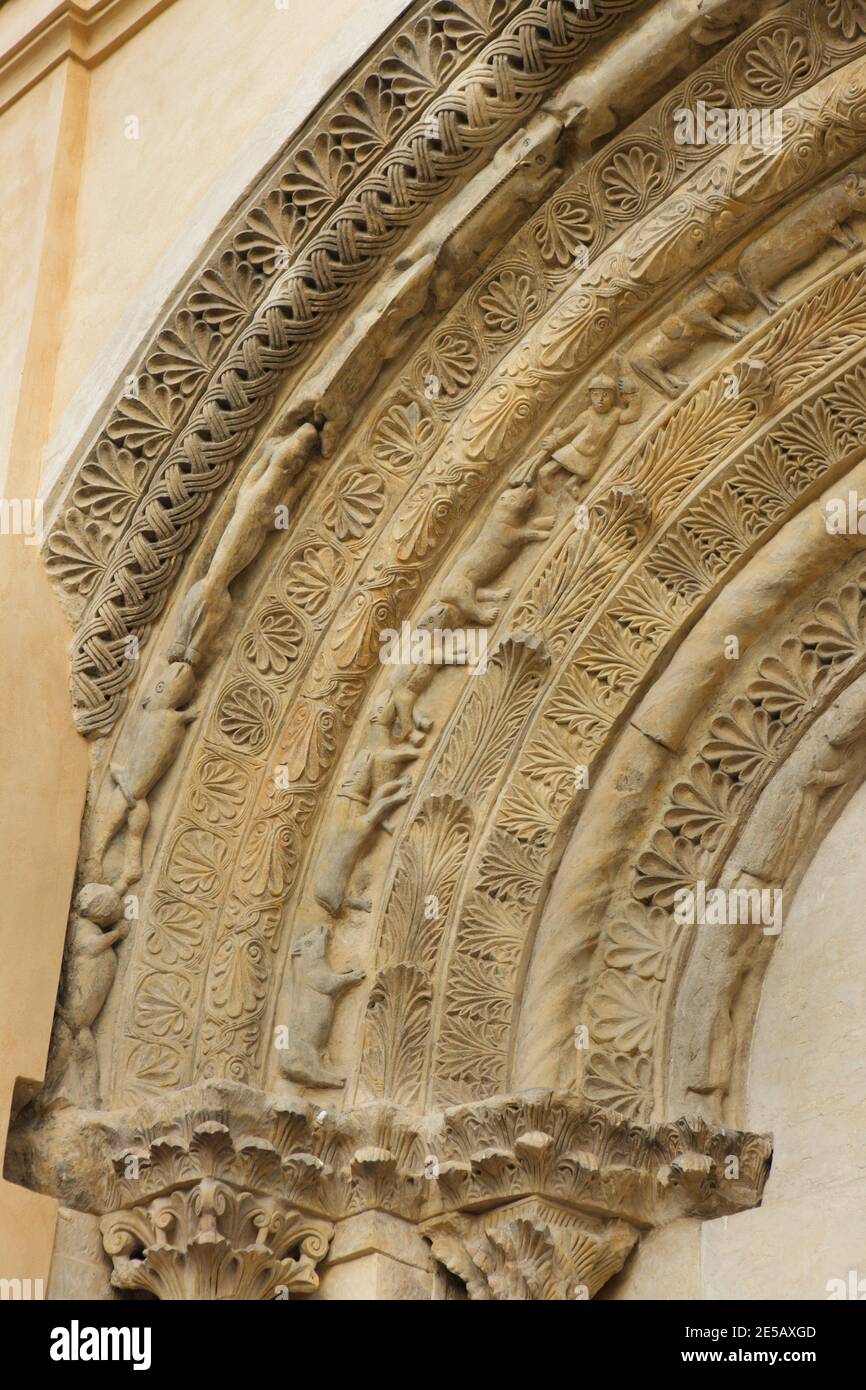 Dogs and wolves depicted in the Romanesque portal dated from the last quarter of the 12th century on the south facade of the Church of Saint Procopius (Kostel svatého Prokopa) in Záboří nad Labem in Central Bohemia, Czech Republic. Stock Photo