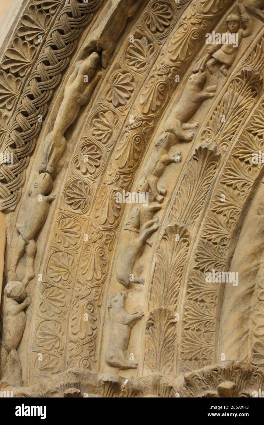 Dogs and wolves depicted in the Romanesque portal dated from the last quarter of the 12th century on the south facade of the Church of Saint Procopius (Kostel svatého Prokopa) in Záboří nad Labem in Central Bohemia, Czech Republic. Stock Photo