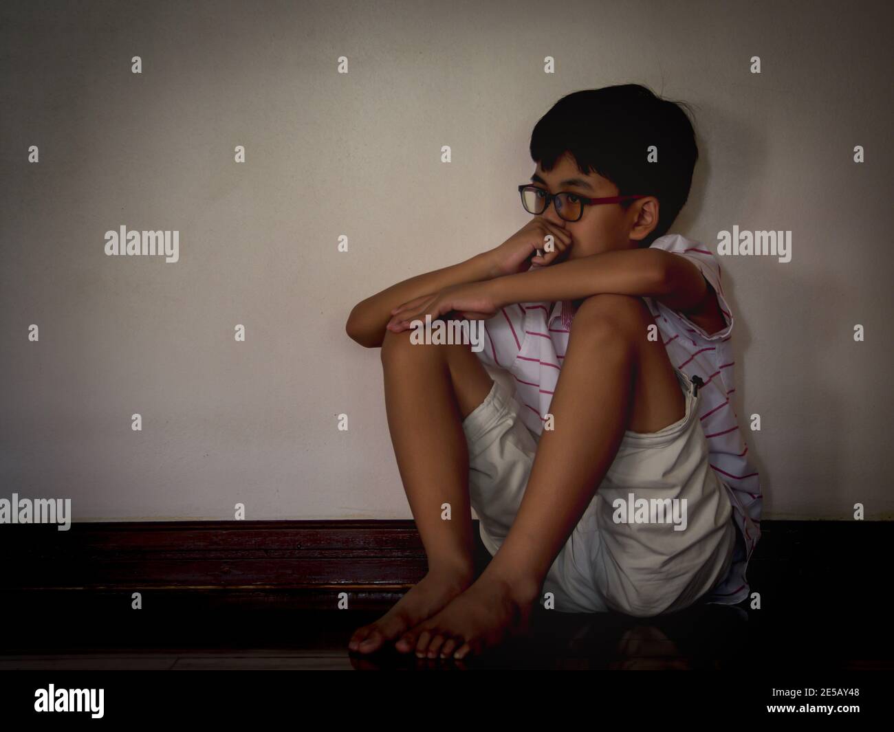 Neglected Face Neglected Lonely Child Leaning At Room corner with sadness and unhappy ...