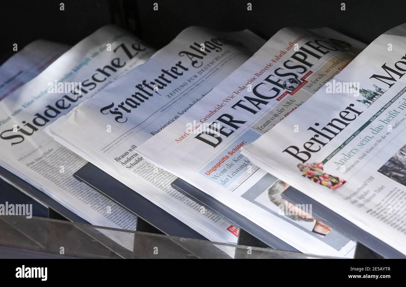 Berlin, Germany. 27th Jan, 2021. Newspapers are on display in a newsagent's shop. Credit: Jens Kalaene/dpa-Zentralbild/ZB/dpa/Alamy Live News Stock Photo
