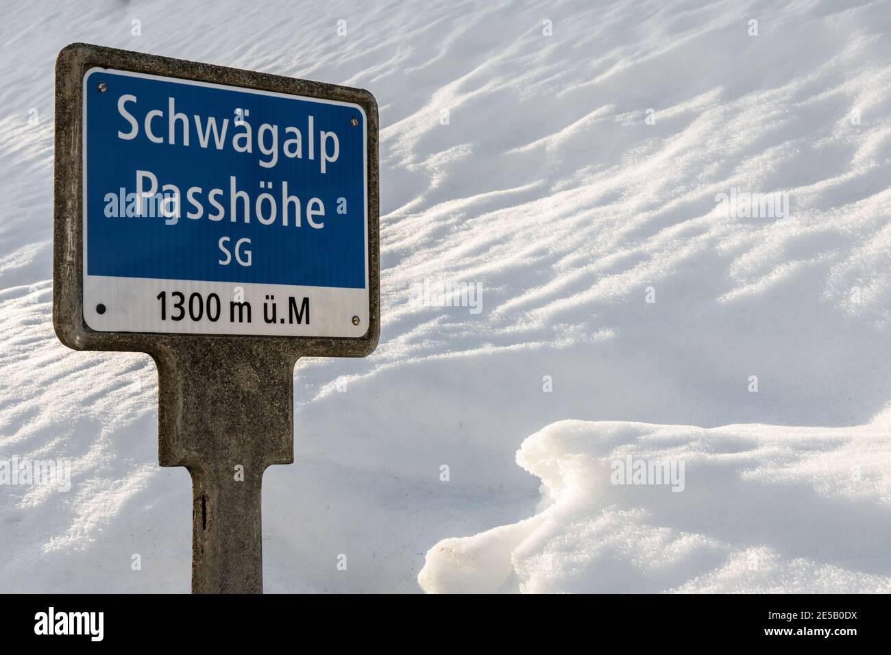 Sign with altitude indication on the Schwaegalp summit in winter, Canton of St.Gallen, Switzerland Stock Photo
