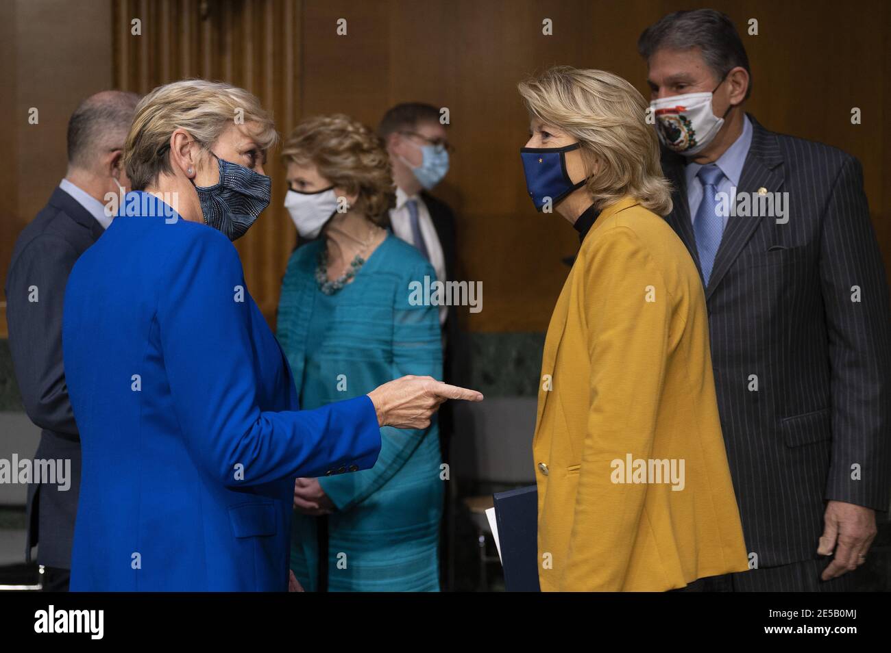 Washington, United States. 27th Jan, 2021. Chairwoman Lisa Murkowski (2nd R), R-Alaksa, and Ranking Member Joe Manchin (R), D-WV, speaks with Former Michigan Governor Jennifer Granholm ahead of a erhearing to examine h nomination of to be Secretary of Energy, on Capitol Hill in Washington, DC, on January 27, 2021. Photo by Jim Watson/UPI Credit: UPI/Alamy Live News Stock Photo