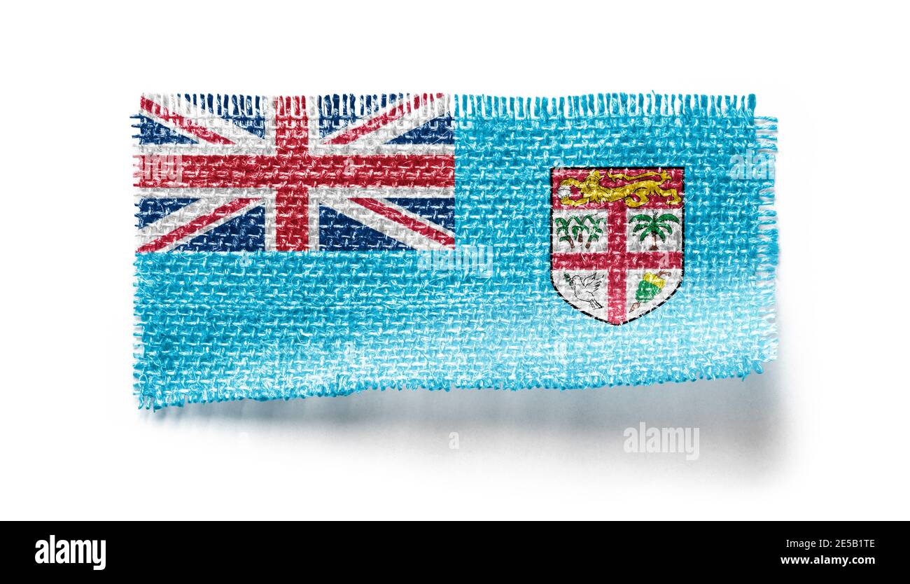 Fiji flag on a piece of cloth on a white background Stock Photo