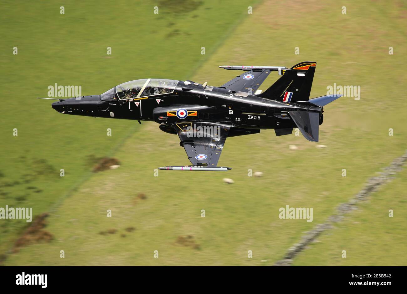 RAF Hawk T2 training aircraft on a low level flight in the mach loop area of Wales, UK. Stock Photo