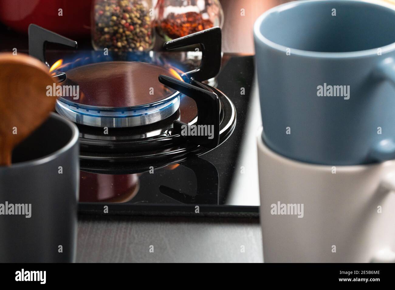 Burning gas stove burner in a kitchen Stock Photo Alamy