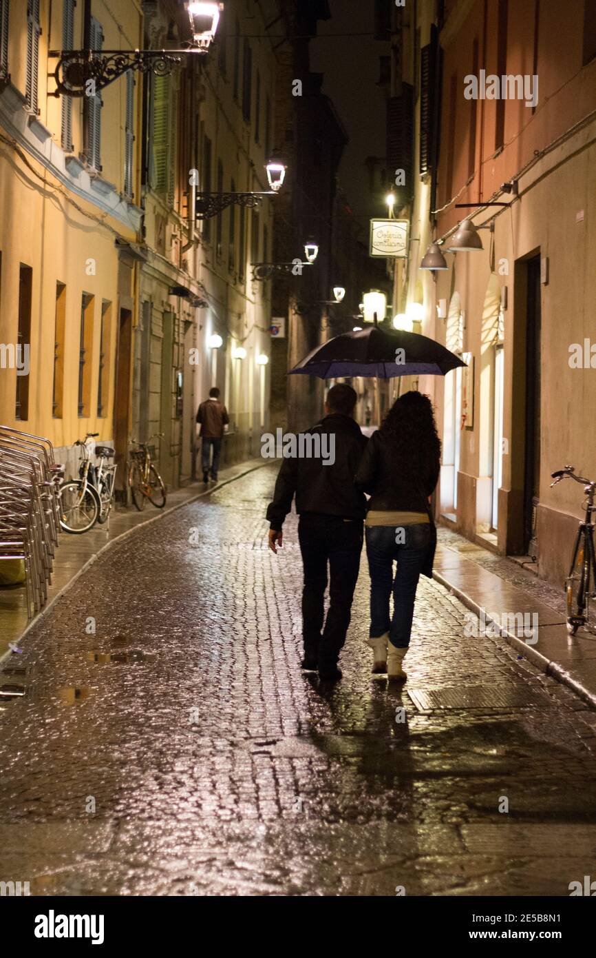 couple out for a walk on a rainy day Stock Photo