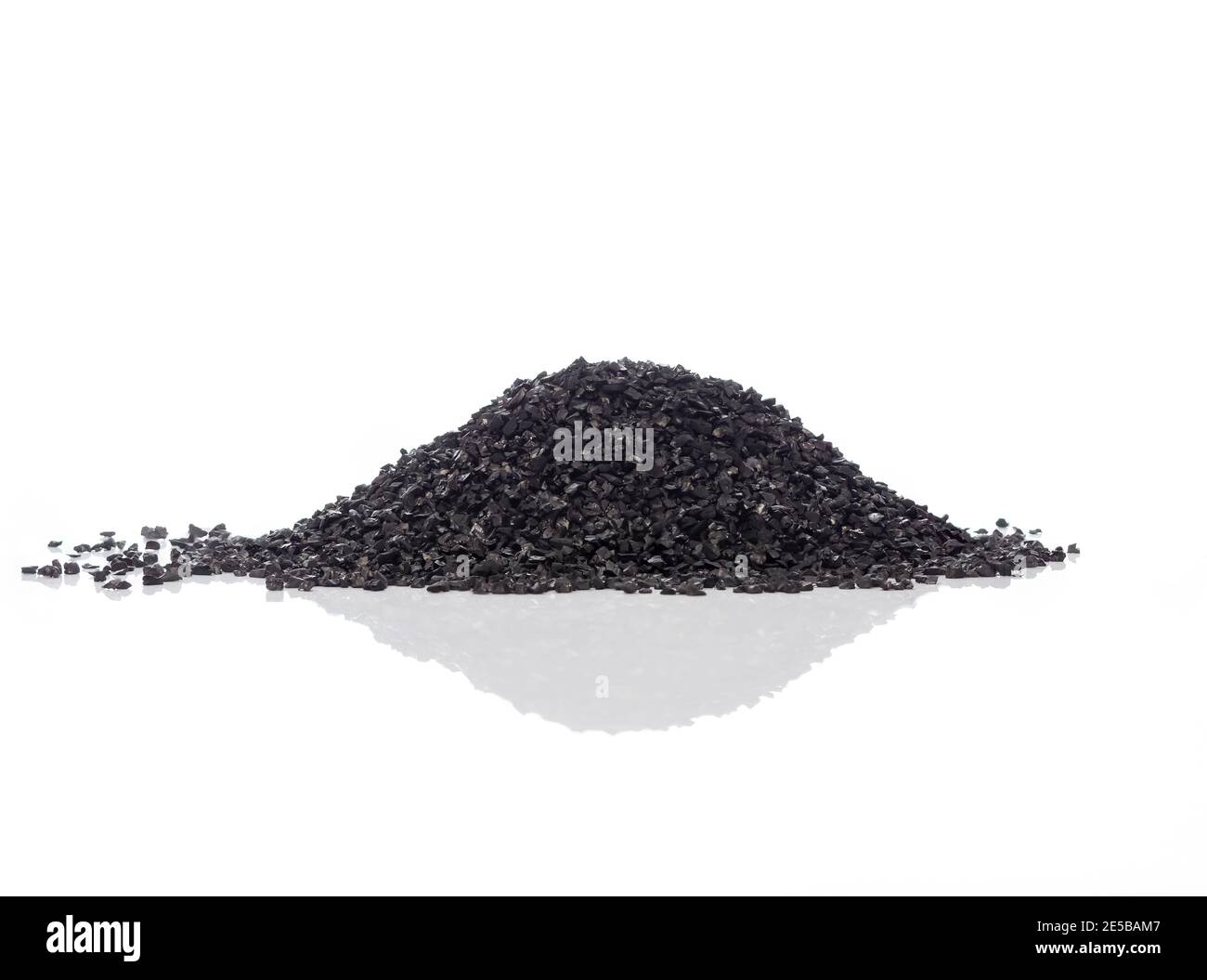 Graphite powder is generally used as lubricant. Isolated on white Stock