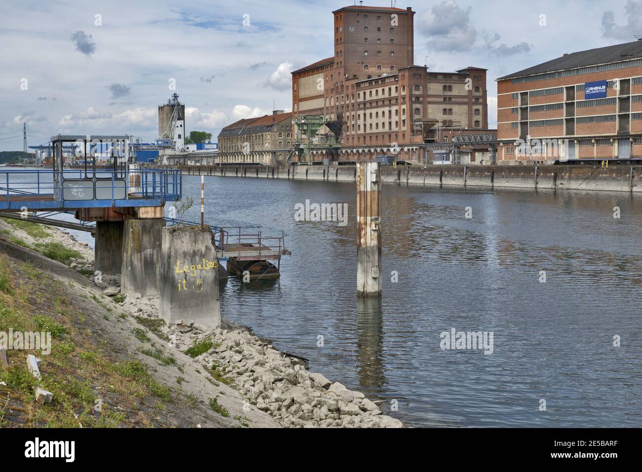 Karlsruhe, Germany: port of Karlsruhe with river rhine, ships, cranes and storage buildings Stock Photo