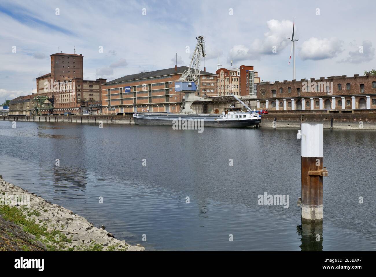 Karlsruhe, Germany: port of Karlsruhe with river rhine, ships, cranes and storage buildings Stock Photo