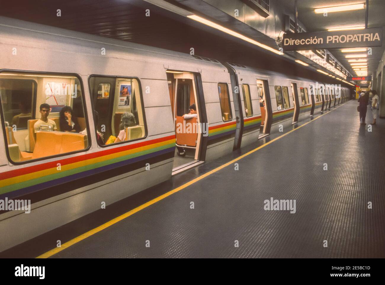 CARACAS, VENEZUELA, 1988 - Metro train platform and train cars with passengers. Stock Photo