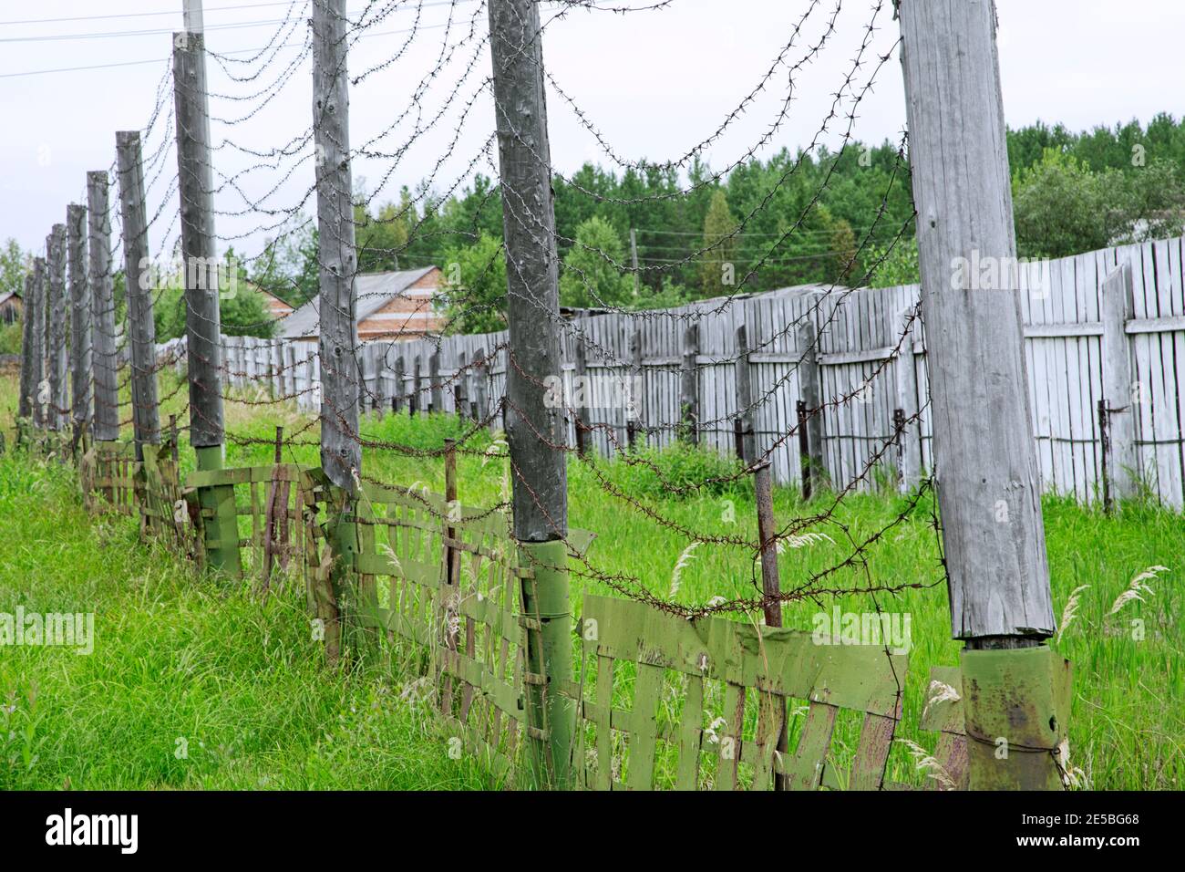 Barbwire fence at Gulag Perm-36 / ITK-6 / Gulag Museum, Soviet forced labour camp near the village Kuchino, Perm Krai, Russia Stock Photo