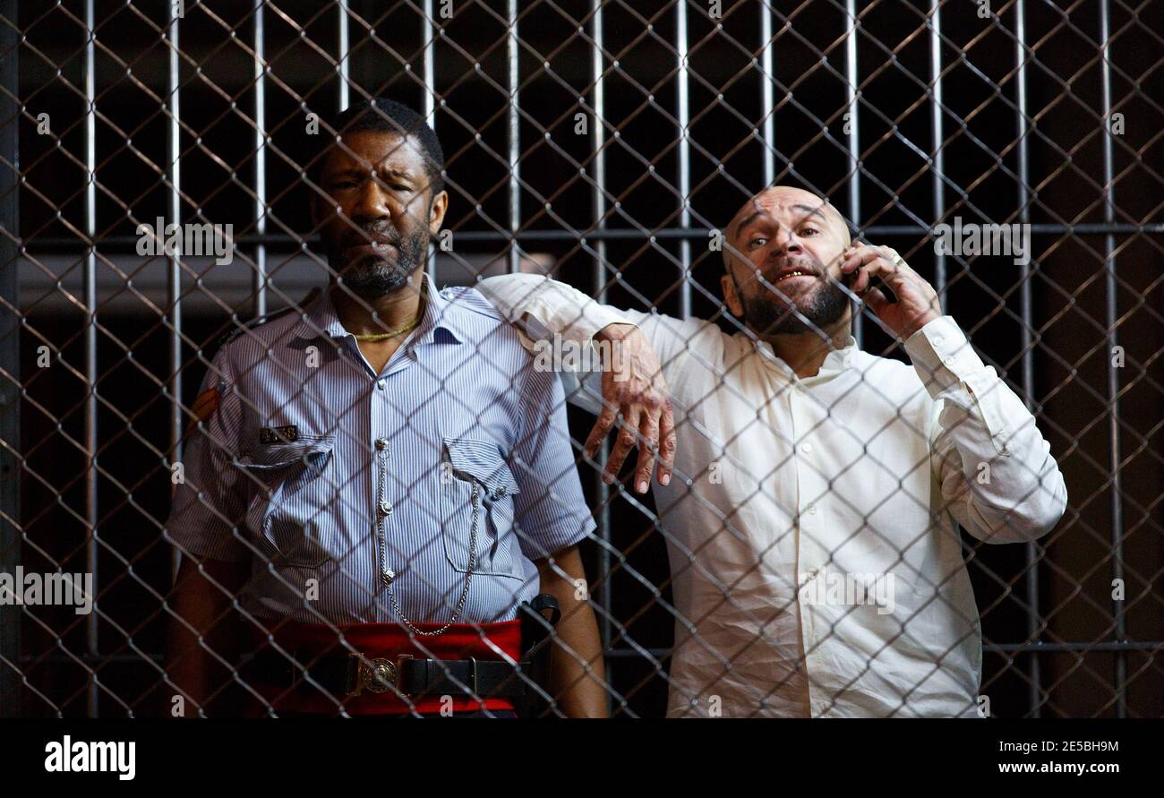 l-r: Brian Bovell (Marcus), Goldie (Joker) in KINGSTON 14 by Roy Williams at the Theatre Royal Stratford East, London E15  03/04/2014  design: Ultz  lighting: Jo Joelson  director: Clint Dyer Stock Photo