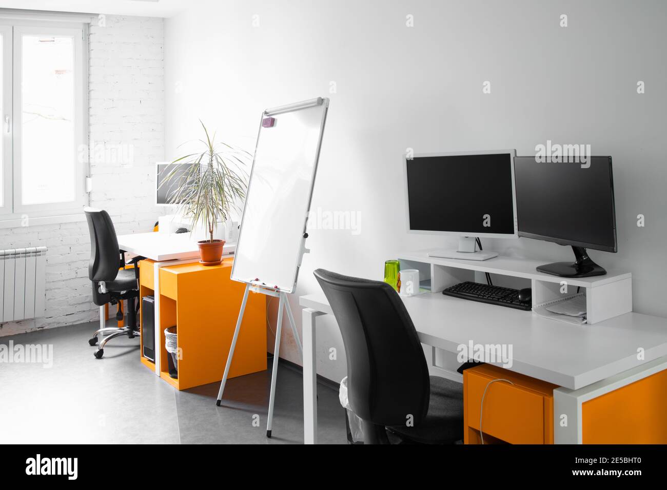 Workspace of a small professional company team Stock Photo