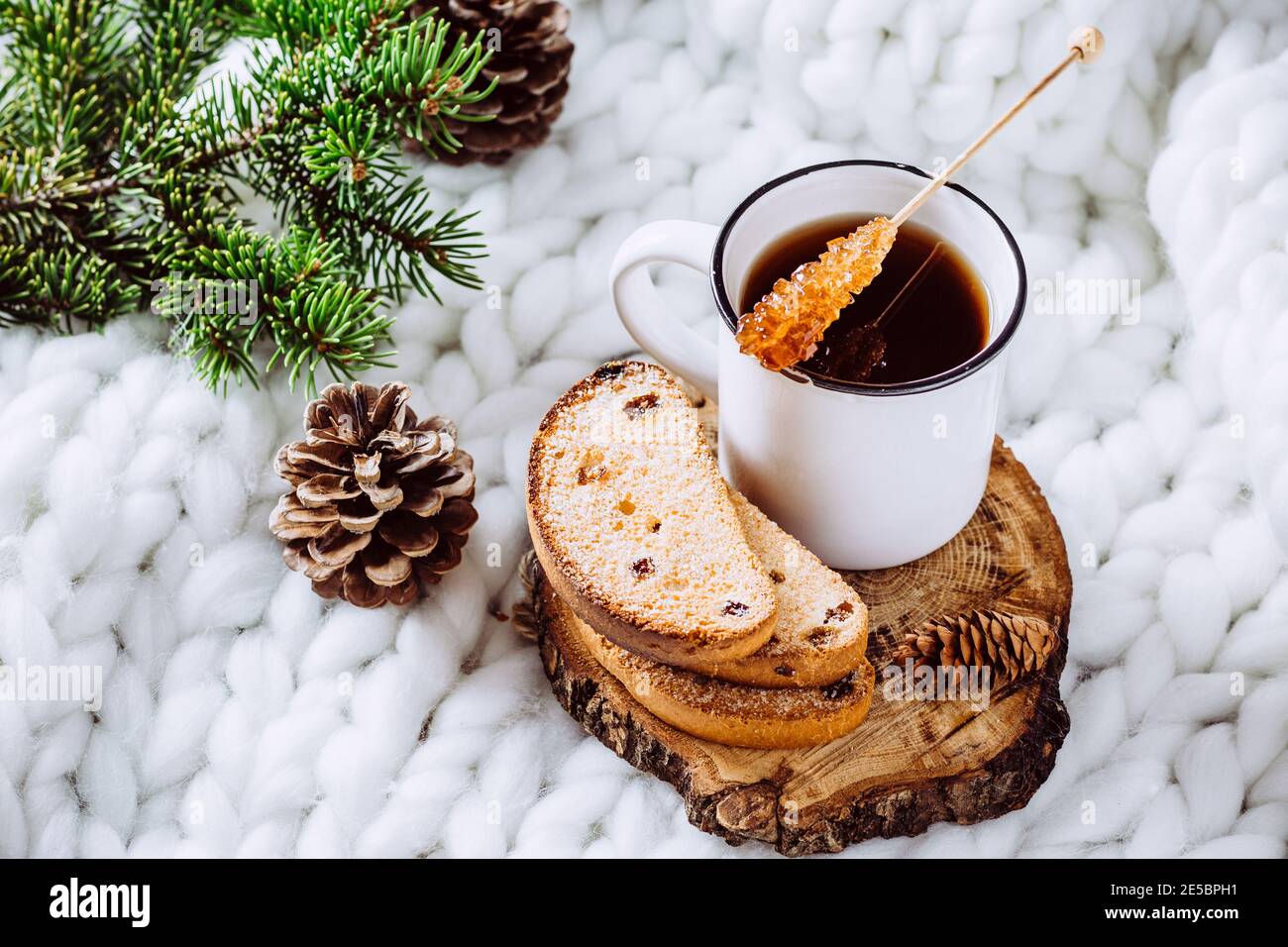 Coffee and cookies on a white blanket. Home comfort Stock Photo
