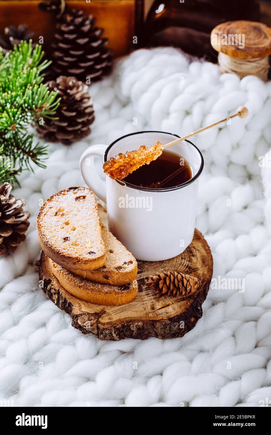 Coffee and cookies on a white blanket. Home comfort Stock Photo