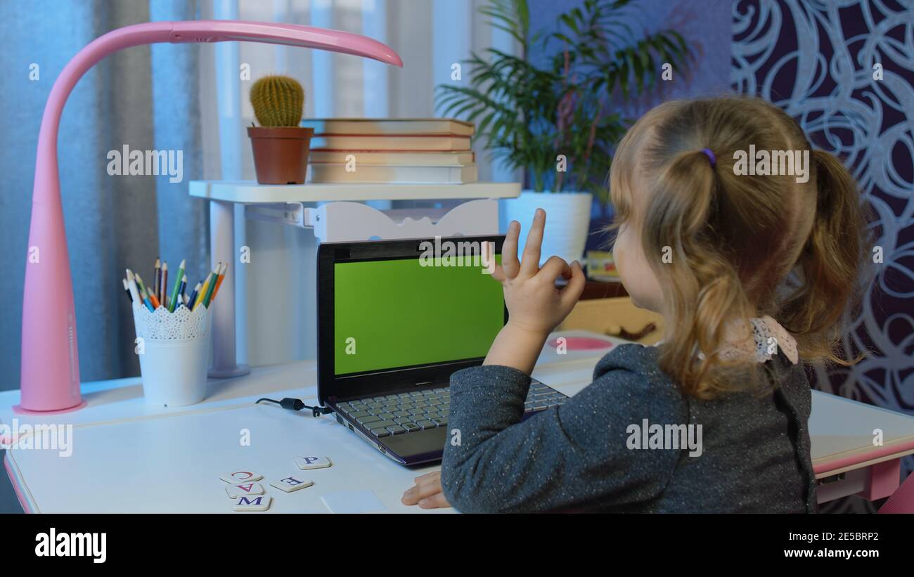 Preschool child girl distance online learning at home. Pupil kid ...