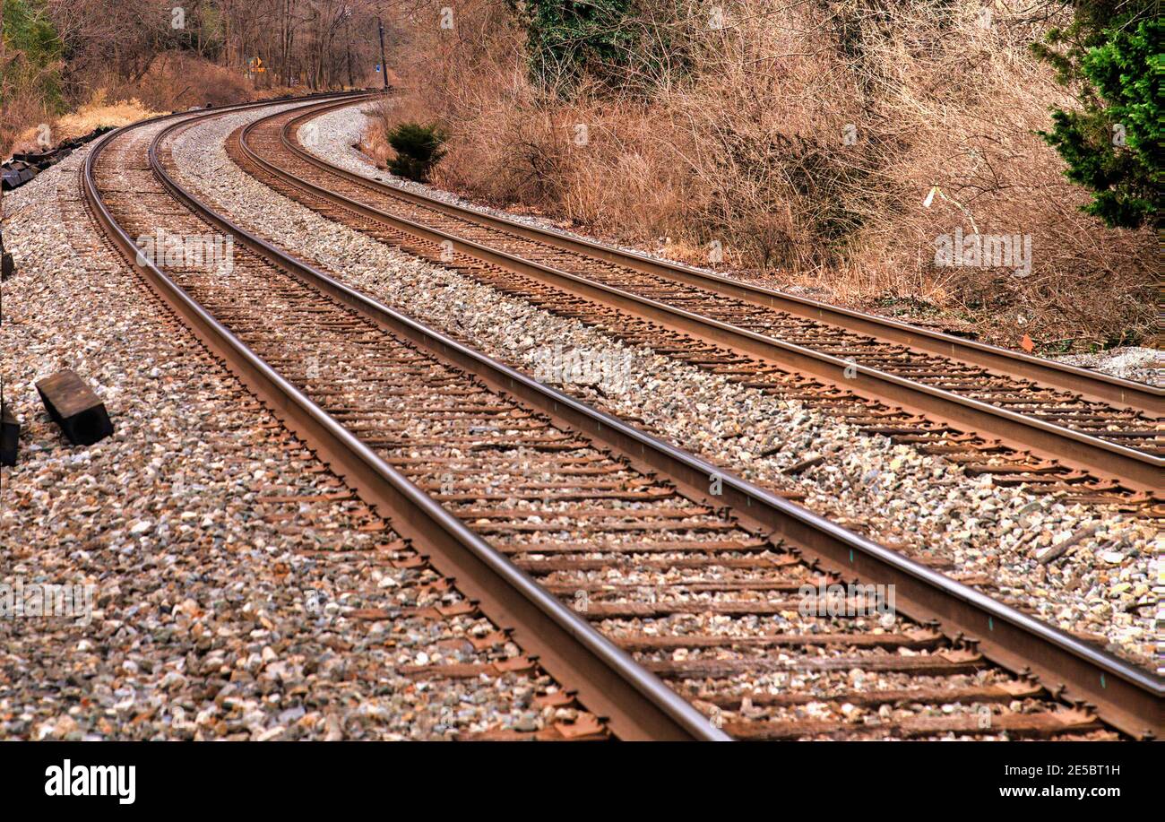 Rail tracks curve around a bend Stock Photo Alamy