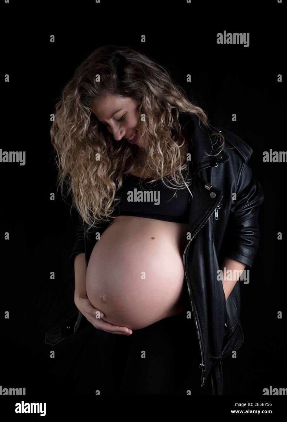 Woman dark pregnant hi-res stock photography and images - Alamy