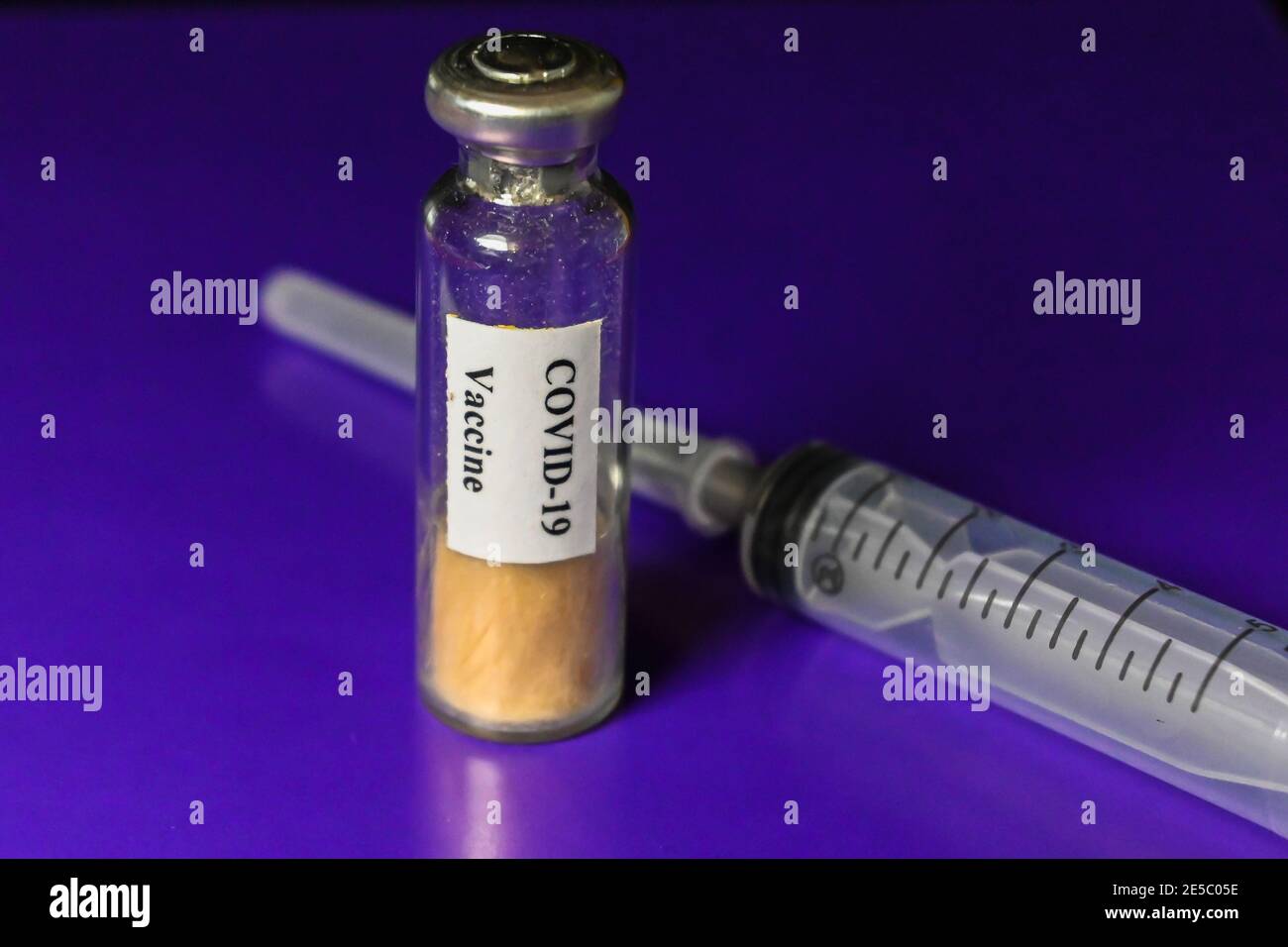 Vaccination against coronavirus. Vaccine vial to prevent COVID-19. Stock Photo