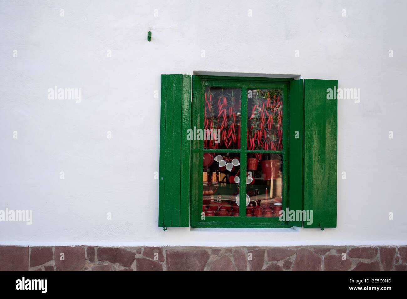 window with dried peppers Stock Photo