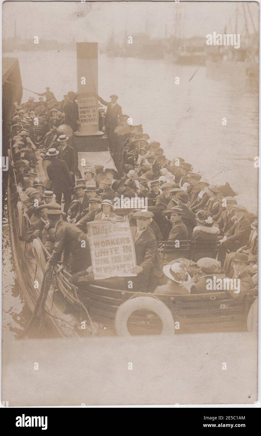 Advertising campaign for the Daily Citizen, a short-lived British newspaper published by the Labour Party between 1912 - 1915. Two men are shown displaying posters promoting the newspaper on a crowded pleasure steamer as it either docks or sets sail Stock Photo