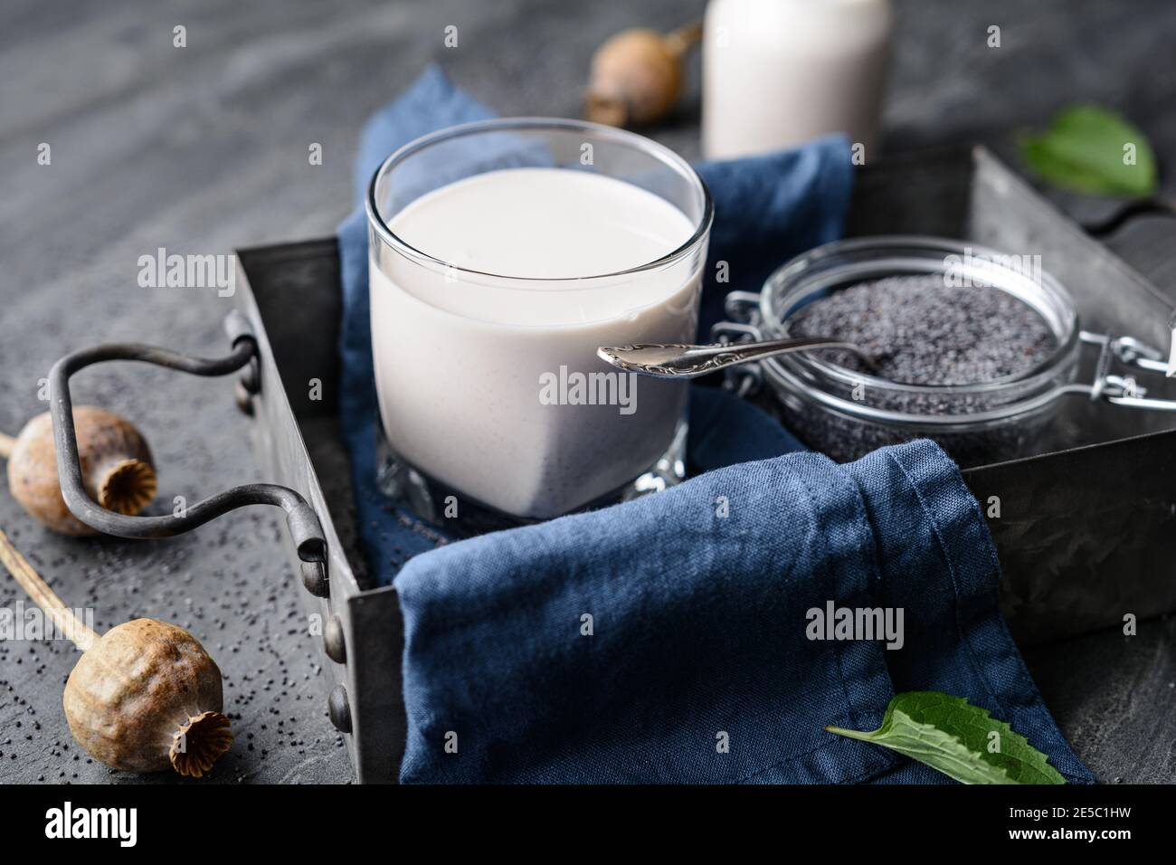Healthy poppy seed milk, dairy free and calcium rich vegan drink in a glass Stock Photo