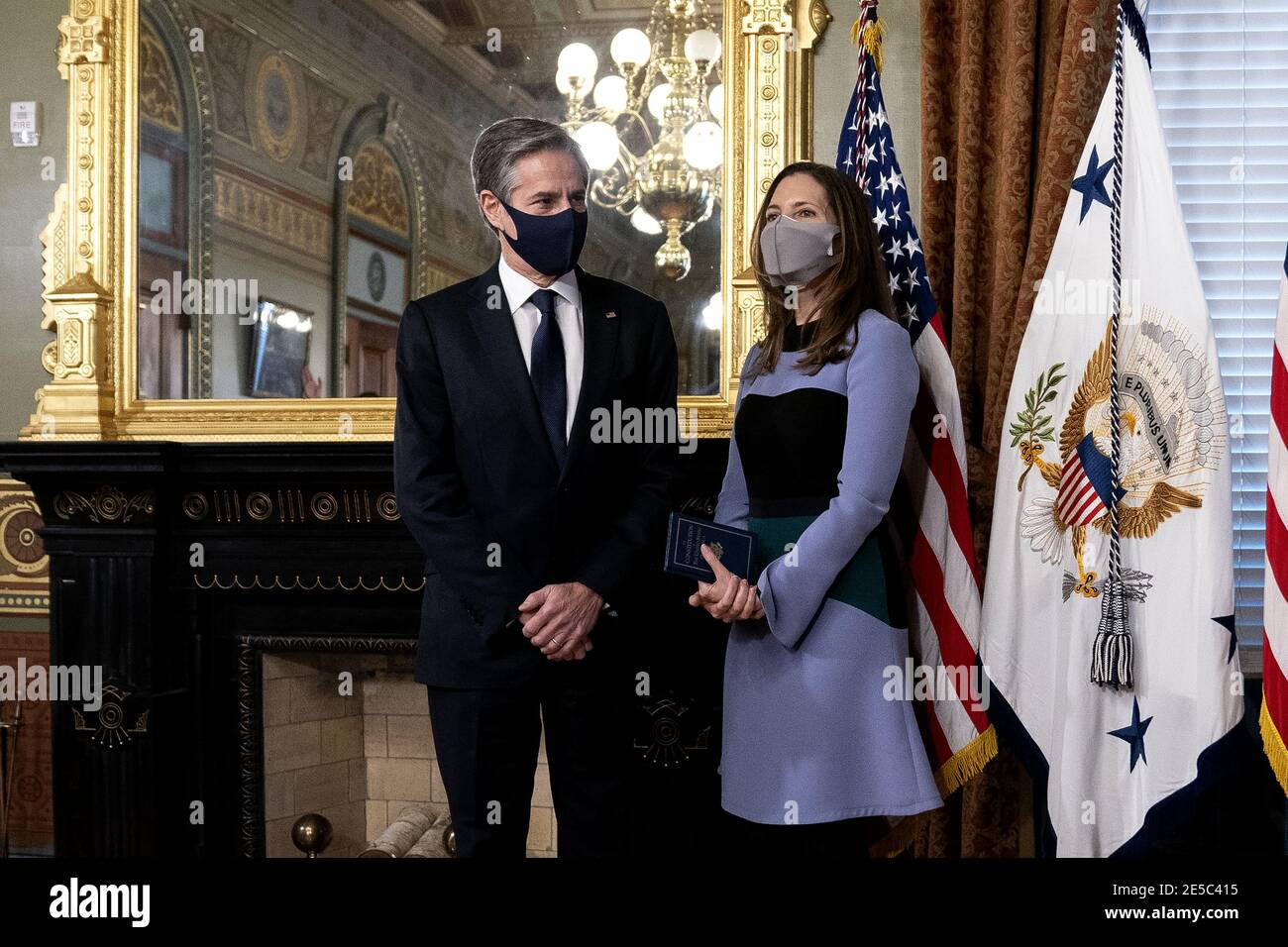 Washington, United States. 27th Jan, 2021. Antony Blinken, U.S. secretary of state, left, and his wife Evan Ryan stand during a swearing in ceremony at the White House in Washington, DC on Wednesday, January 27, 2021. The Senate yesterday confirmed Blinken, giving one of President Biden's longest-serving aides the task of resuming nuclear negotiations with Iran and restoring trust with allies shaken by four years of the Trump administration. Photo by Stefani Reynolds/UPI Credit: UPI/Alamy Live News Stock Photo