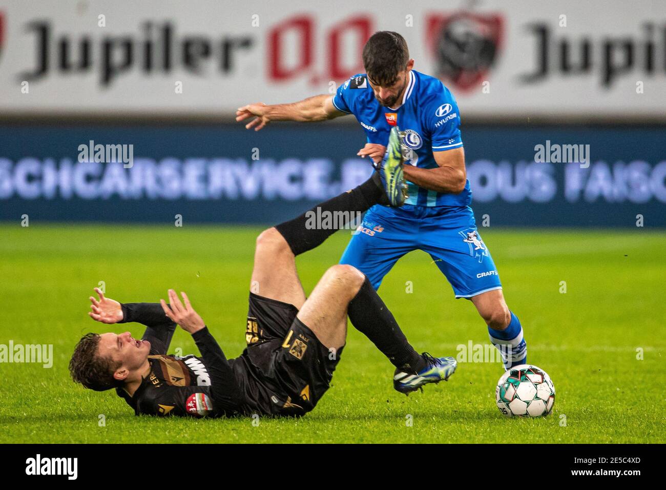 STVV's Facundo Colidio and Gent's Milad Mohammadi fight for the ball during a soccer match between KAA Gent and K Sint-Truiden VV, Wednesday 27 Januar Stock Photo