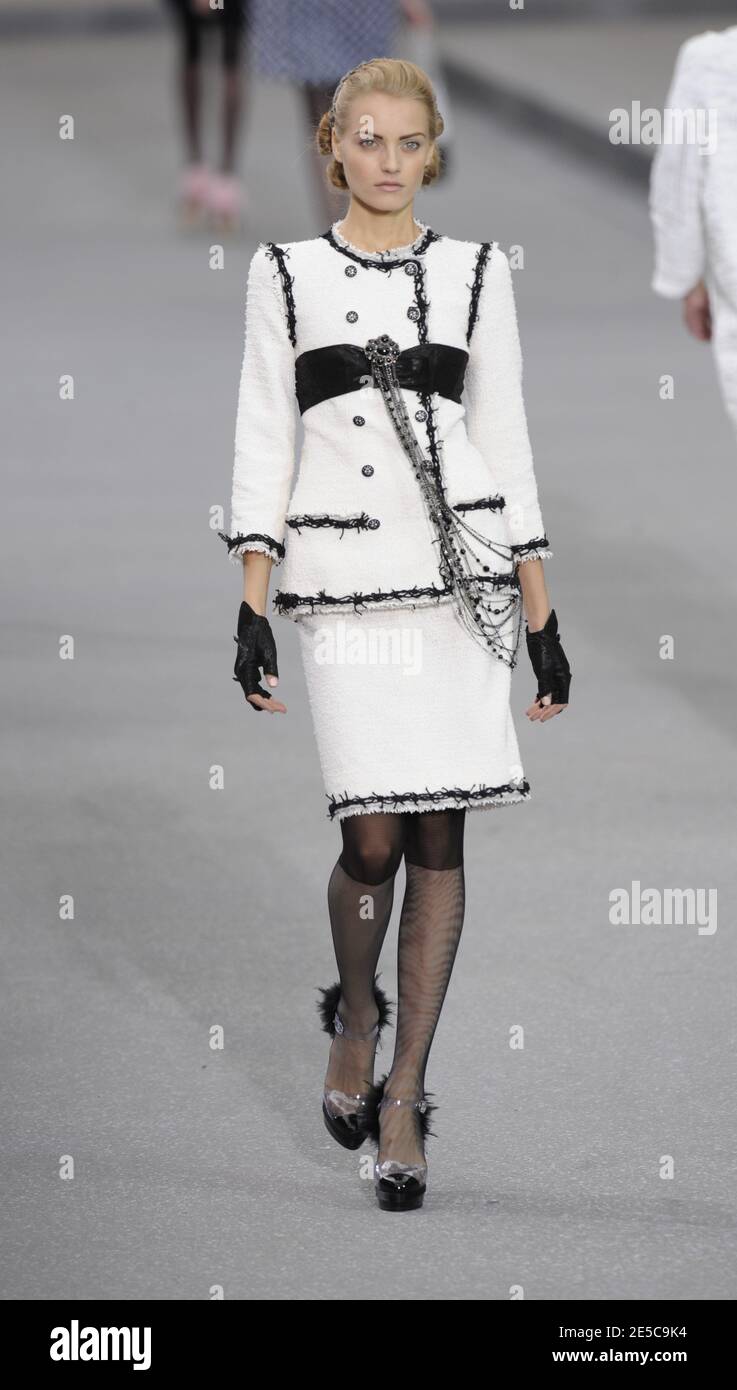 A model displays a creation by designer Karl Lagerfeld for Chanel